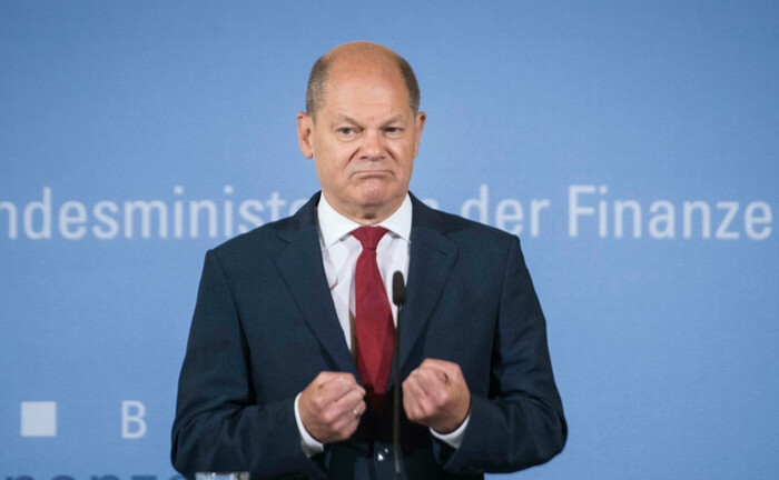 Finanzminister Olaf Scholz bei einer Pressekonferenz zur Umsetzung des Konjunkturpakets am 12. Juni 2020: Finanzprofis rechnen mit einer längerfristigen Abschwungphase.  | © imago images / Bildgehege